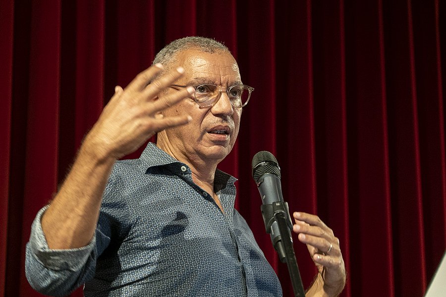 Dr. Patrice Poutrus auf der Bühne des Spremberger Spreekinos
